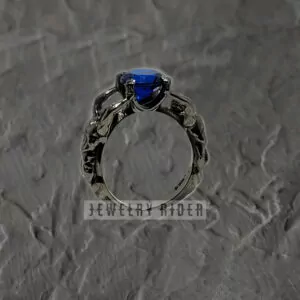 Nude Gay Men Holding a Stone Ring