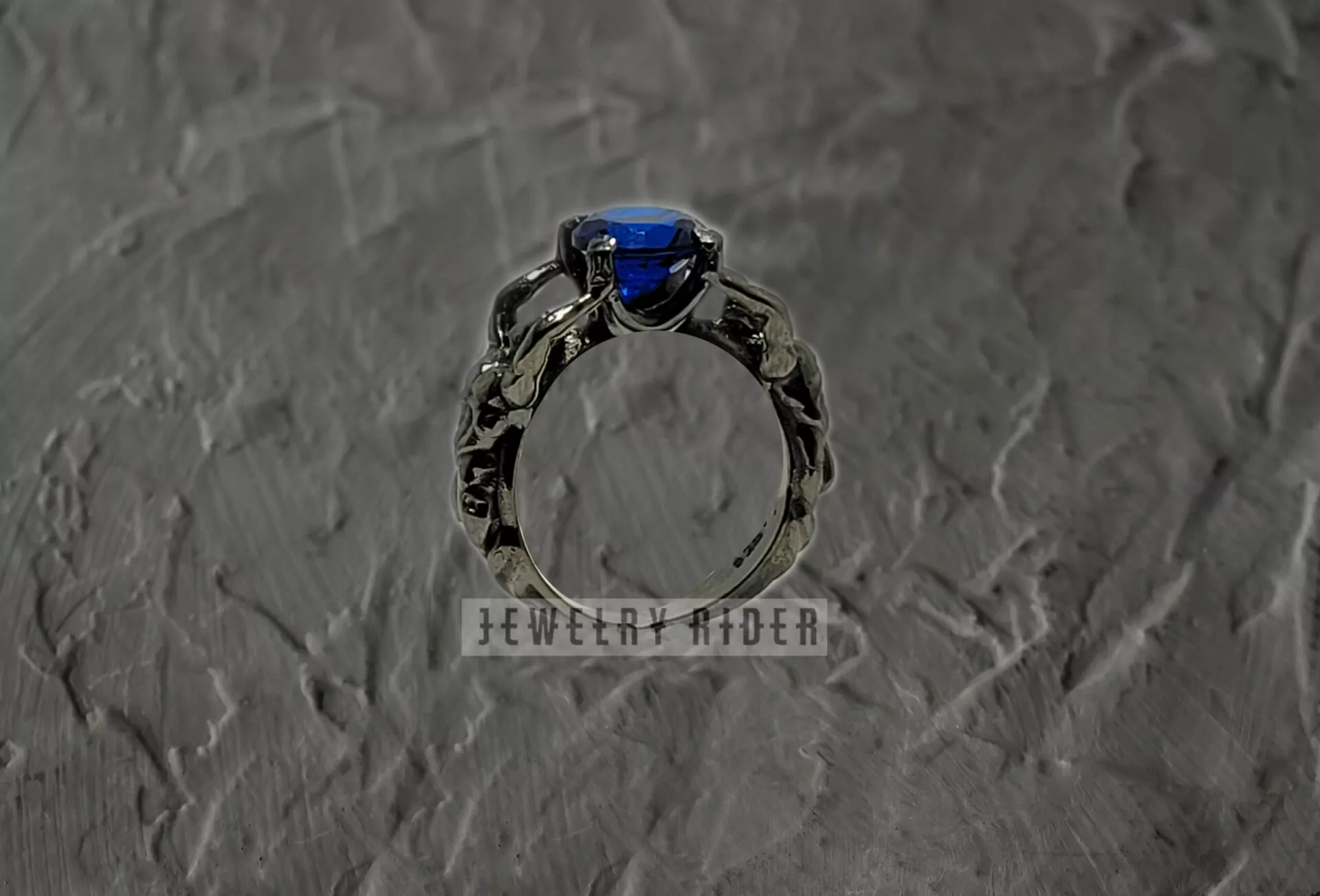 Nude Gay Men Holding a Stone Ring