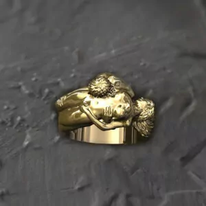 Nude couple in foreplay position statement ring