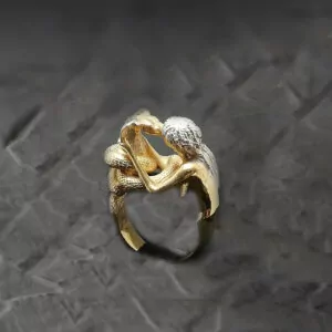 Woman kissing a cobra snake