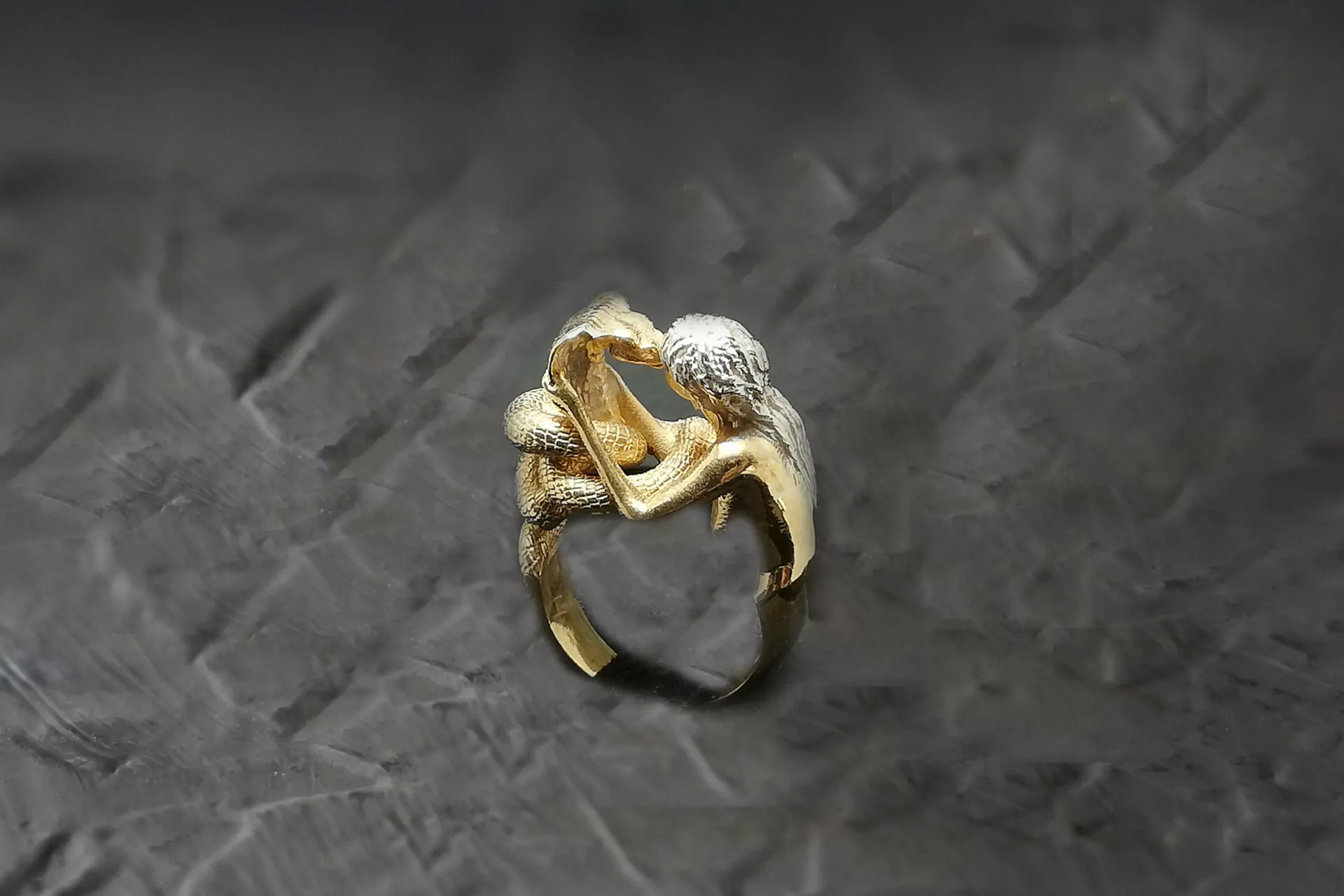 Woman kissing a cobra snake