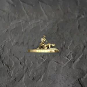 An erotic sculpture of a Mistress pegging her slave